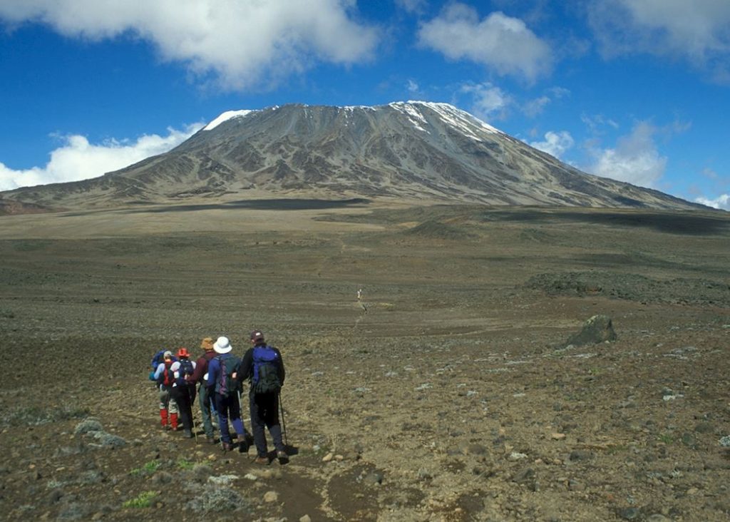 climb mountain with rowlandsafaris